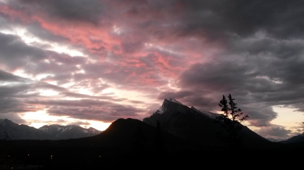 Sunrise above Mt. Rundle from our room at the Juniper Hotel. © Tabitha Friesen